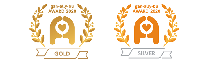 日立システムズが受賞した「がんアライアワード2020 GOLD」ロゴ（左）、グループ3社が受賞した「がんアライアワード2020 SILVER」ロゴ（右）
								